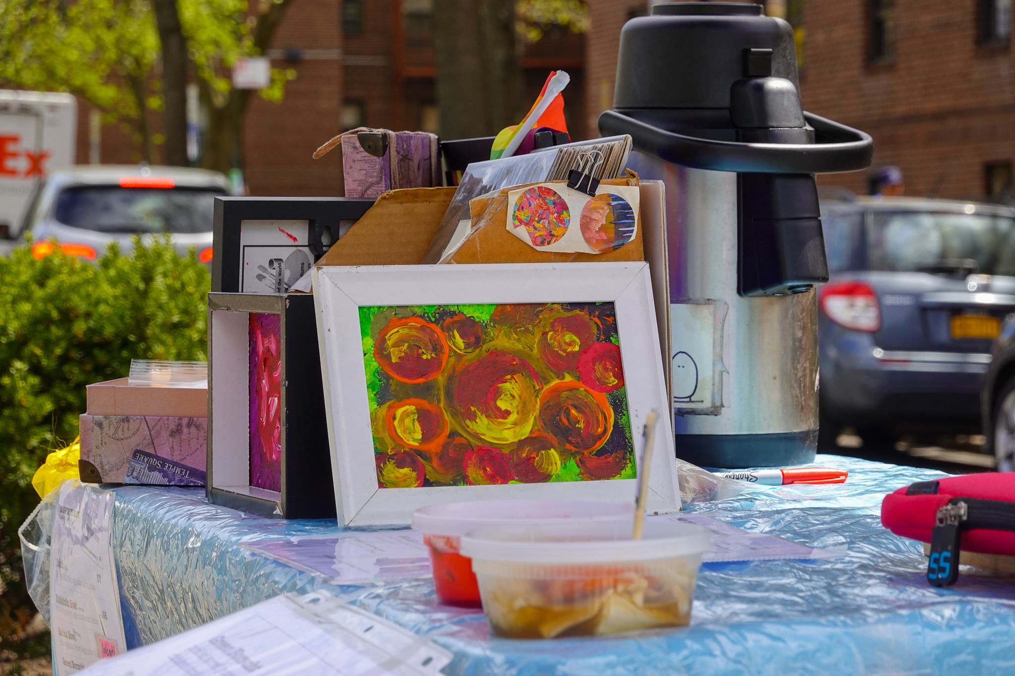 Esthi displays her artwork on the Sandwich Therapy table